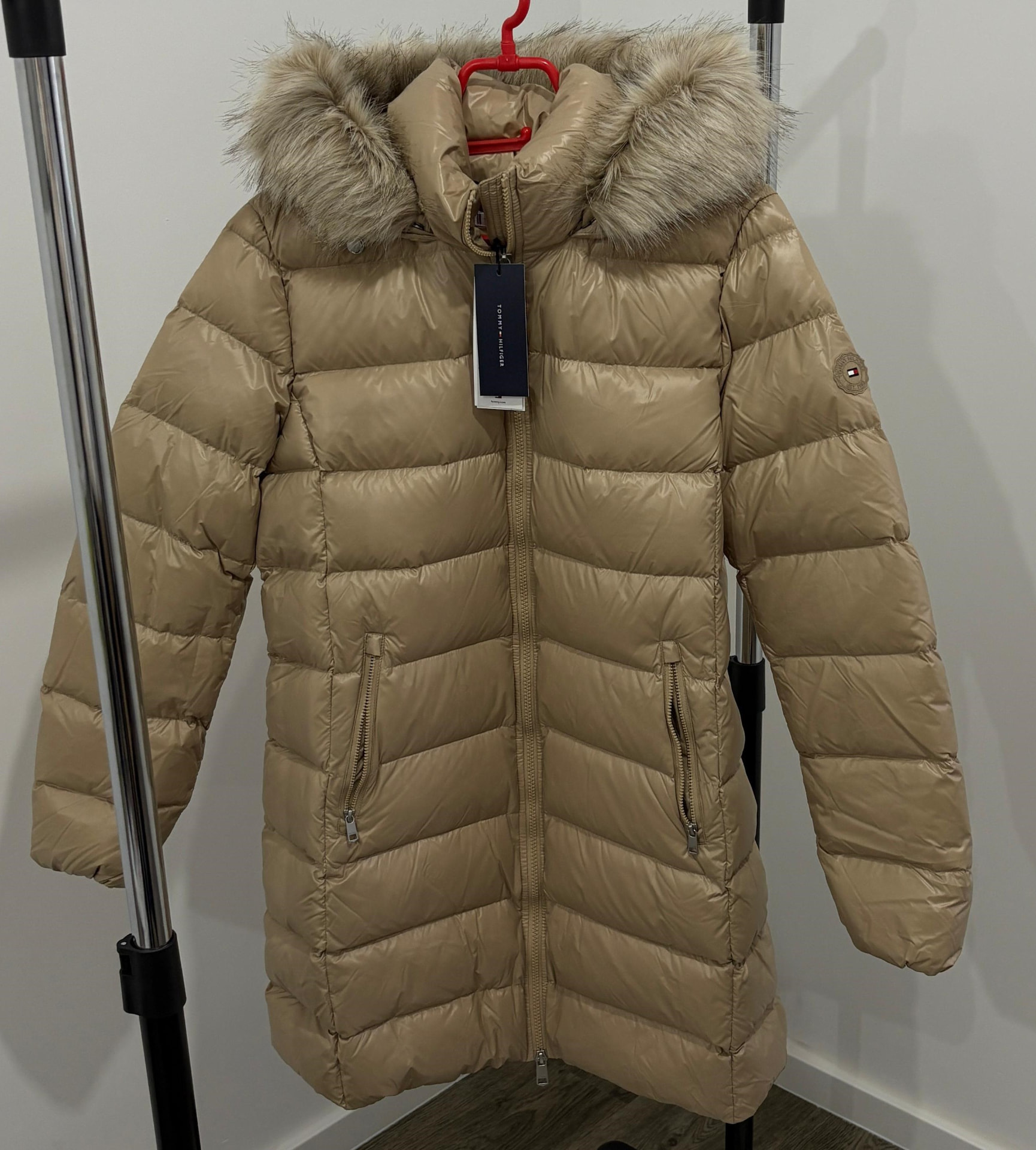 Beige puffer jacket with fur hood before