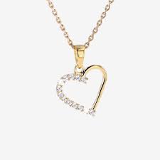 Gold heart necklace before